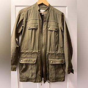 Army green utility jacket.